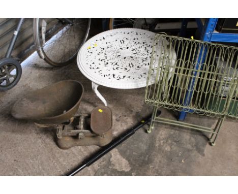 A SMALL CAST METAL TABLE TOGETHER WITH A FOLDABLE STAND, VINTAGE SCALES ETC.