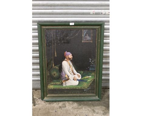 P. On KARLAL (XIX-XX). Indian school, portrait study of a nobleman kneeling on a mat and holding a sword, signed lower right,