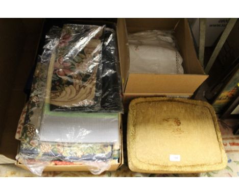 TWO BOXES OF TEXTILES AND LINEN TO INCLUDE HAND STITCHED EXAMPLES TOGETHER WITH A VINTAGE UPHOLSTERED FOOT STOOL