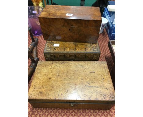 Three various walnut boxes including a marquetry inlaid sewing box (no fittings), a tea caddy (no original fittings) and anot