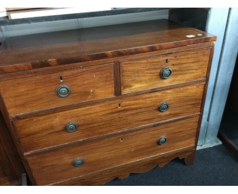 A Regency mahogany caddy topped four drawer chest of drawers, resting on bracket feet.