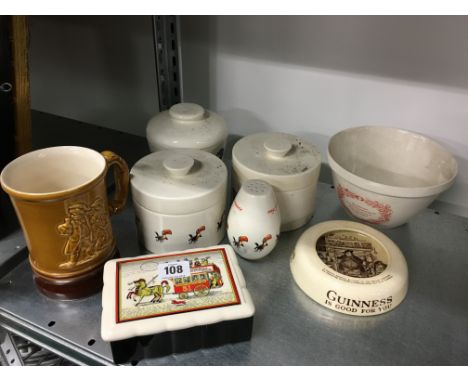 A collection of eight various Guinness china advertising items including Carlton Ware storage jars, Christmas Pudding bowl, a