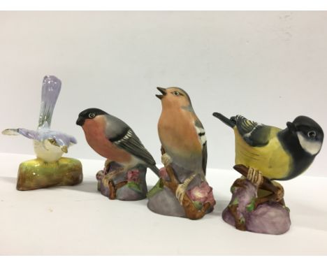 A Royal Worcester bone china bird: Chaffinch (3240) together with another: Bullfinch (3238), Great Tit (3335) and a J.T Jones