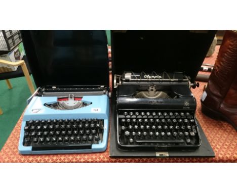 An early 20th century Olympia Elite German portable typewriter together with a late 20th century Brother typewriter.