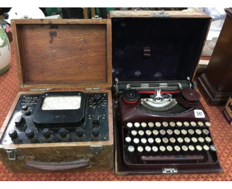 An early 20th century Bijou (burgundy painted) portable typewriter and case together with a Taylor Universal meter Model 85A.