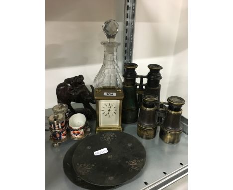 Two pairs of binoculars together with a carriage clock and other items.