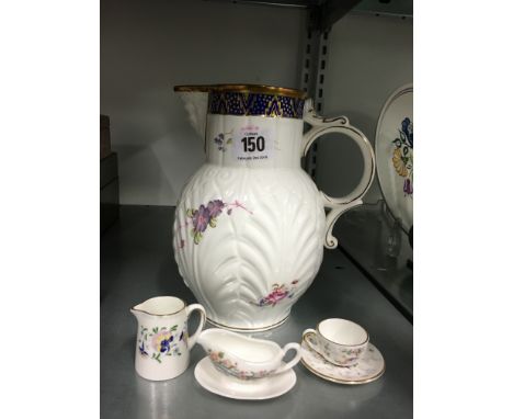 A Coalport bone china reproduction Caughley Mask Head jug together with three miniature Coalport bone china items.