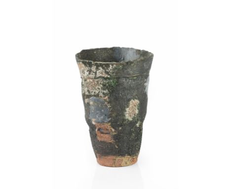 Robin Welch (1936-2019) Vessel stoneware, with textured black glaze with blue detail impressed potter's seal 15cm high.