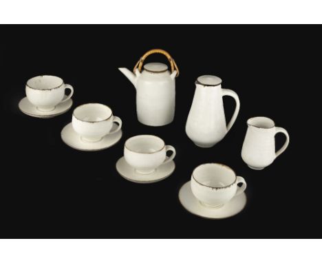 Lucie Rie (1902-1995) and Hans Coper (1920-1981) Tea and coffee set comprising four cups and saucers, teapot with cane handle