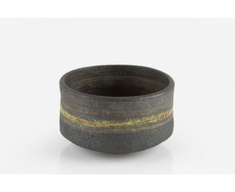 Robin Welch (1936-2019) Tea bowl  stoneware, with graduated dark glaze with a band of yellow impressed potter's seal 7.5cm hi