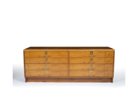 Archie Shine for Robert Heritage Chest of drawers yew wood with brass ring handles 57cm high, 147cm wide.