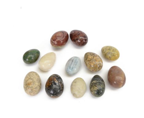 Collection of specimen eggs, including fossilised coral, red jasper, marble etc 