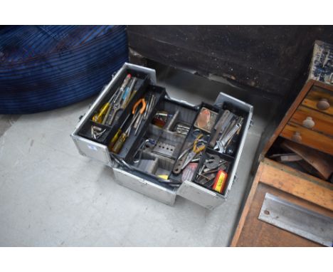 A metal cantilever toolbox and contents