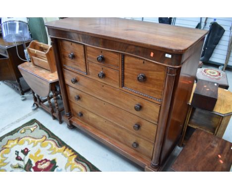 A Victorian mahogany scotch style chest having interesting drawer formation, some moulding has come loose, but is included, n