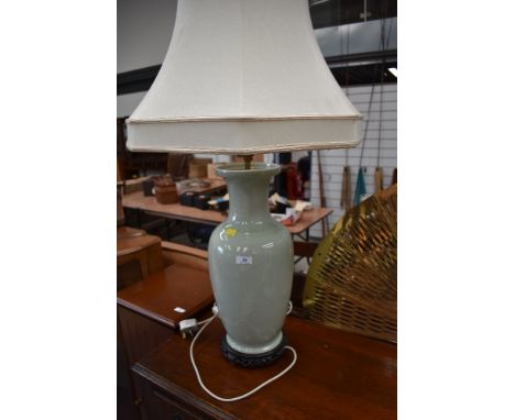 A large Oriental vase type floor or table lamp of jade green Oriental design, height of base approx. 50cm