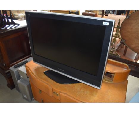 A Panasonic 32' TV and surround sound system