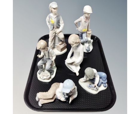 Six Nao figures of boys 