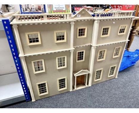A Georgian style double fronted doll's house with accessories, together with a Pollocks Regency puppet theatre, album of Quee