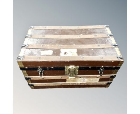 An antique metal bound shipping trunk 