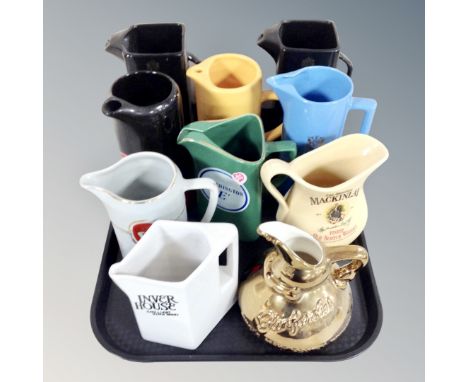 Ten ceramic jugs bearing brewery advertising 