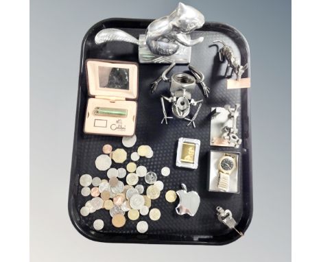A boxed Colibri lighter, foreign coins and animal ornaments 