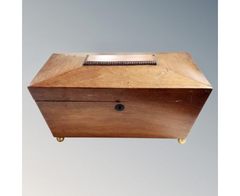 A 19th century mahogany sarcophagus tea caddy   