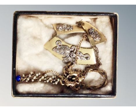 A vintage Marcasite collar necklace and faux pearl brooch decorated with horses 