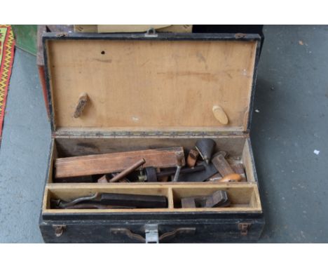 A vintage painted pine carpenters case with internal shelf and fittings and a quantity of tools to include planes, drill, and