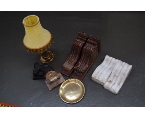 A mixed lot to include a pair of marble brackets and a pair of wooden wall brackets, a vintage hole punch, a desk calendar, a