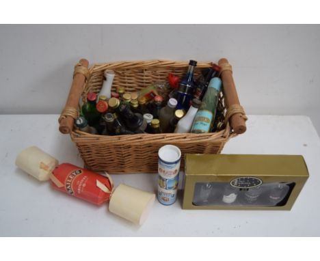 A large quantity of miniatures including Rum, Port, Brandy, Gin and Licqueurs along with Baileys Cracker with 71ml bottle, tw