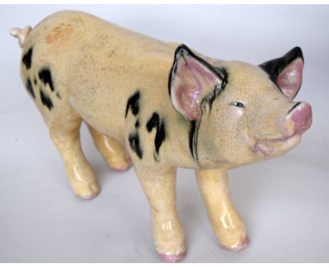 A ceramic crackle glaze pig figurine 55 x 37cm