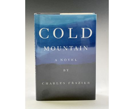 CHARLES FRAZIER. 'Cold Mountain.' First edition, unclipped dj, first state with "man-woman" instead of "mad-woman" on p25, At