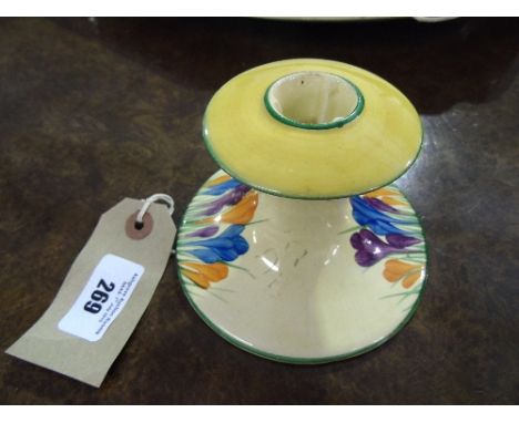 A Clarice Cliff Candlestick, decorated with the crocus pattern