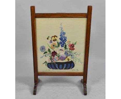 An Embroidered Firescreen, 46cm wide 
