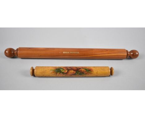A Modern Roller Ruler with Handles which Open to Reveal Pencil and Rubber Holders together with a Smaller Roller Rule with pa