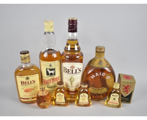 A Collection of Various Bottles of Blended Scotch Whisky, Haig, White Horse and Bells 