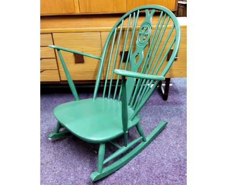 An Ercol 'fleur de lys' rocking chair, painted green c.1970 
