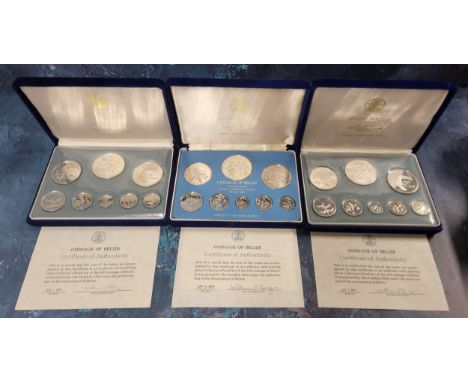 A Sterling Silver proof set of the Coinage of Belize 1974 comprising Ten, Five &amp; One Dollar coins and Fifty, Twenty-five,