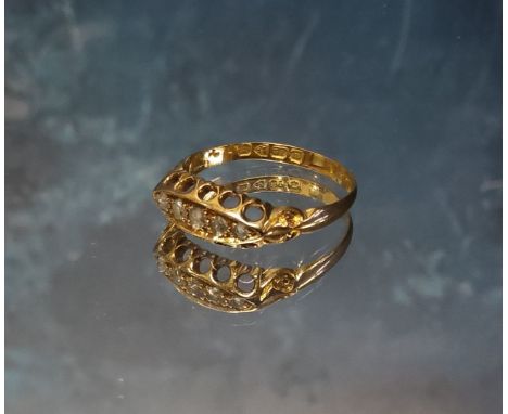 An 18ct gold gypsy ring set with five round diamonds, size O, Chester, 1912, 2.58g gross 