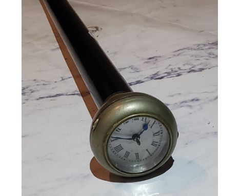 An early 20th century 'pocket watch' novelty walking cane, the chrome ball handle with watch, ebonised stick, 90cm long, c.19