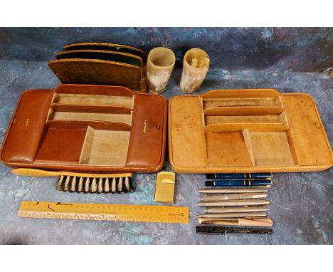 A leather Keep Tidy accessories tray, 33cm wide;&nbsp; another;&nbsp; two horn beakers;&nbsp; a Zippo lighter;&nbsp; Parker p