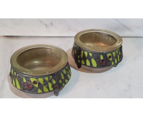 A pair of Soviet Russian silver and cloisonne enamelled cauldron salts, three buttress feet, 5.5cm diam, first quarter of 20t