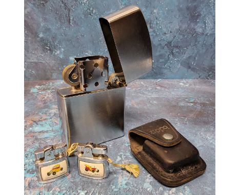 A shop display oversized Zippo style lighter; a Zippo black leather belt pouch a pair of 'Pacific' miniature collectible ligh