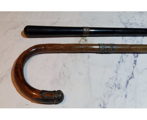 A 19th century silver mounted bamboo walking stick, silver collar and ferrule, 90cm long, c.1890;&nbsp; another, ebonised, 88