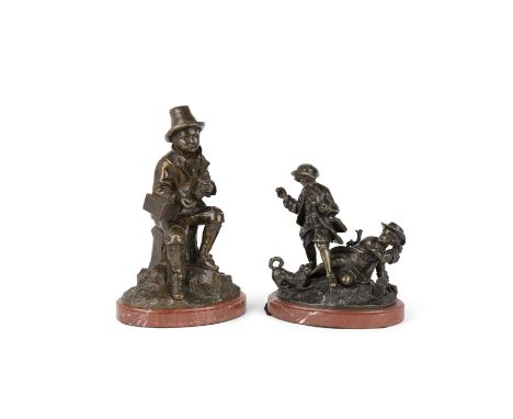 A French bronze model of boy, late 19th / early 20th century, depicted seated on a tree stump, wearing a hat and holding a ra