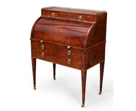 A George III amboyna cylinder bureau, last quarter 18th century, with mahogany crossbanding, the pierced brass gallery top ab