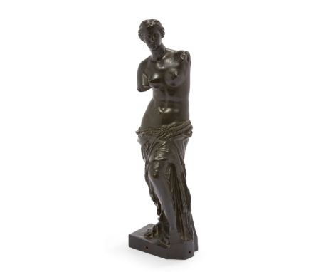A French bronze model of the Venus de Milo, after the Antique, early 20th century, the standing figure shown partially draped