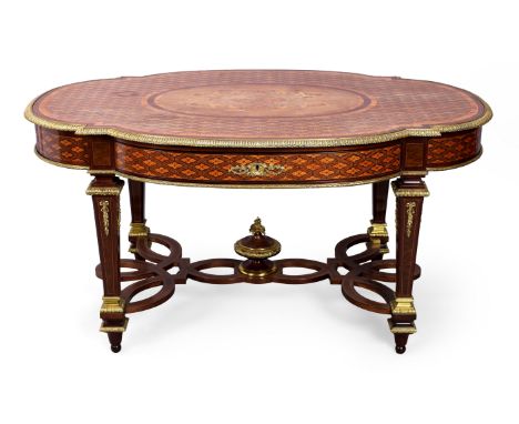 A French gilt-bronze mounted inlaid rosewood centre table, in the manner of Paul Sormani, last quarter 19th century, the shap