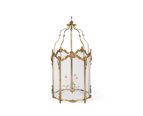 A French gilt-bronze three-light hall lantern, of Louis XV style, late 19th century, of hexagonal serpentine form with curved