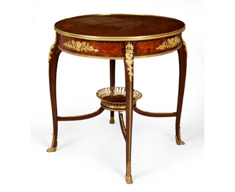 A French ormolu mounted parquetry and kingwood circular occasional table, in the manner of François Linke, first quarter 20th